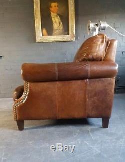 2111. Chesterfield Vintage Club Leather Tan armchair Courier available
