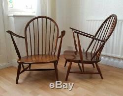 2 Antique dark wooden Ercol chairs Occasional Accent fireplace with cushions