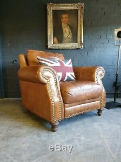 3008. Chesterfield tan Vintage Club Leather Armchair & Pouffe Courier av