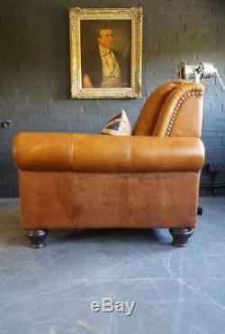 897. Chesterfield Vintage Club Leather Tan armchair Courier available