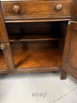 A vintage ERCOL Old Colonial dresser two drawers cupboards plate rack kitchen st