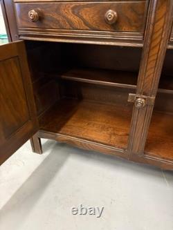 A vintage ERCOL Old Colonial dresser two drawers cupboards plate rack kitchen st