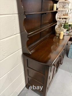 A vintage ERCOL Old Colonial dresser two drawers cupboards plate rack kitchen st