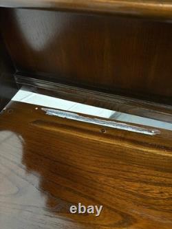 A vintage ERCOL Old Colonial dresser two drawers cupboards plate rack kitchen st