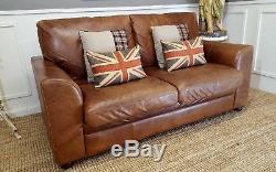 Halo Vintage Tan Two Seater Weathered Leather Sofa Courier Available