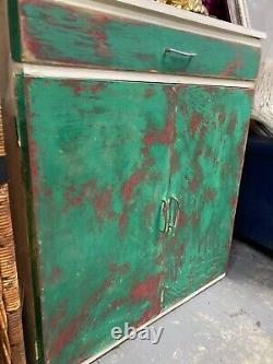 Kitchen 1960s unit vintage, retro cabinet, distressed paint. Funky and bright