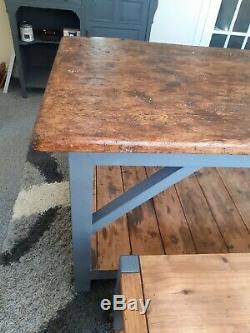 Kitchen/dining table refurbished old school 1950s work bench. Army camp reclaimed
