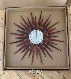 NEWGATE Pluto Clock Sunburst Design 67cm Diameter -(NEW)