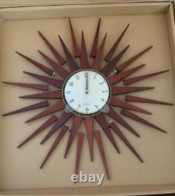 NEWGATE Pluto Clock Sunburst Design 67cm Diameter -(NEW)