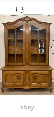 Oak display cabinet with glass doors used
