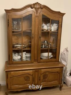 Oak display cabinet with glass doors used