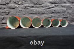 Set of Six Vintage French Graduated Terracotta Enamel Kitchen Storage Canisters