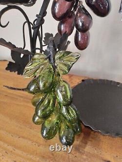 Vintage decorative wrought iron wine dispenser with glass candle vase