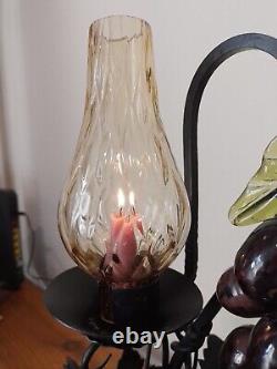 Vintage decorative wrought iron wine dispenser with glass candle vase