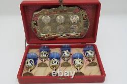 Vintage oriental saki set with a tray, cobalt blue shots in silver cups