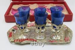 Vintage oriental saki set with a tray, cobalt blue shots in silver cups
