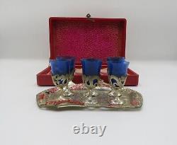 Vintage oriental saki set with a tray, cobalt blue shots in silver cups