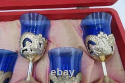 Vintage oriental saki set with a tray, cobalt blue shots in silver cups