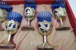 Vintage oriental saki set with a tray, cobalt blue shots in silver cups