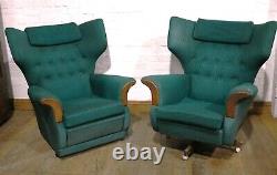 Vintage pair of retro wingback buttoned armchairs