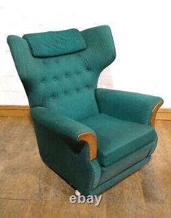 Vintage pair of retro wingback buttoned armchairs