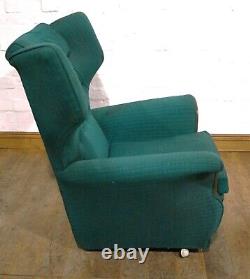 Vintage pair of retro wingback buttoned armchairs