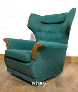 Vintage pair of retro wingback buttoned armchairs