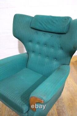 Vintage pair of retro wingback buttoned armchairs