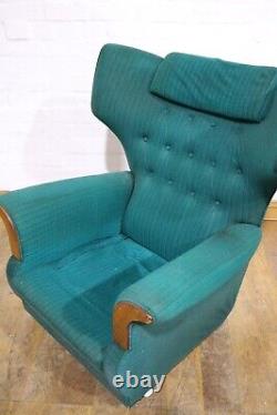 Vintage pair of retro wingback buttoned armchairs