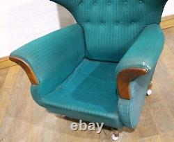 Vintage pair of retro wingback buttoned armchairs