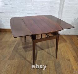 Vintage retro mid century metamorphic side console to a kitchen / dining table