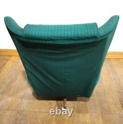 Vintage retro wingback swivel and recline buttoned armchair relaxer chair