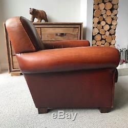 Vintage style Leather Armchair and Footstool, Vintage style leather club chair
