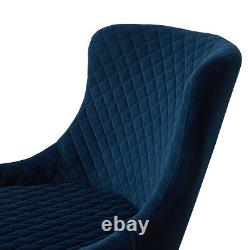 2 chaises de salle à manger en velours bleu avec accoudoirs et pieds en métal noir