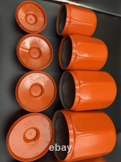 Ensemble de 4 canisters en aluminium Kromex fleurs décor rétro des années 1970 orange
