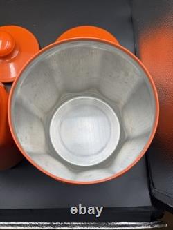 Ensemble de 4 canisters en aluminium Kromex fleurs décor rétro des années 1970 orange