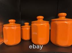 Ensemble de 4 canisters en aluminium Kromex fleurs décor rétro des années 1970 orange