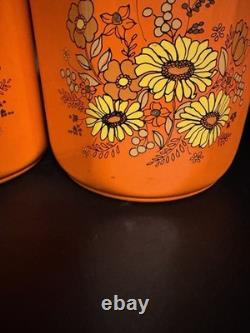 Ensemble de 4 canisters en aluminium Kromex fleurs décor rétro des années 1970 orange