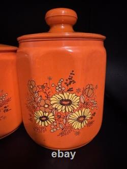 Ensemble de 4 canisters en aluminium Kromex fleurs décor rétro des années 1970 orange