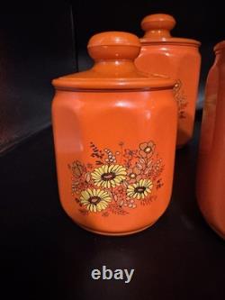 Ensemble de 4 canisters en aluminium Kromex fleurs décor rétro des années 1970 orange
