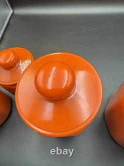 Ensemble de 4 canisters en aluminium Kromex fleurs décor rétro des années 1970 orange