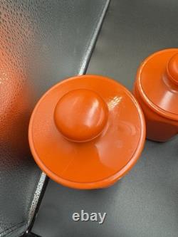 Ensemble de 4 canisters en aluminium Kromex fleurs décor rétro des années 1970 orange