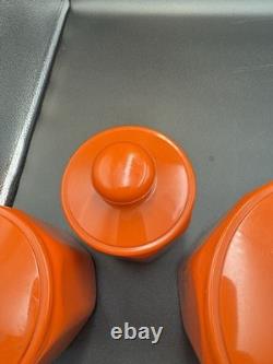 Ensemble de 4 canisters en aluminium Kromex fleurs décor rétro des années 1970 orange