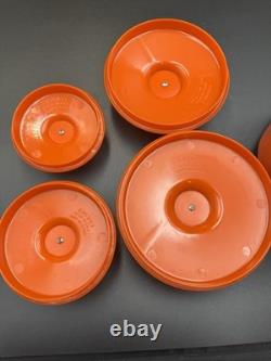 Ensemble de 4 canisters en aluminium Kromex fleurs décor rétro des années 1970 orange