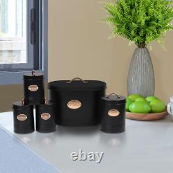 Ensemble de 5 conteneurs de rangement de cuisine noirs : boîte à pain, tins pour thé, sucre, café et biscuits.