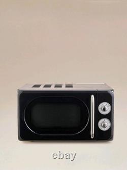 Ensemble de cuisine noir rétro élégant vintage : bouilloire, toaster, micro-ondes, friteuse à air.