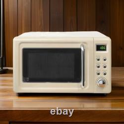 Ensemble de cuisine rétro élégant en crème : micro-ondes vintage, bouilloire rapide et grille-pain grand format.