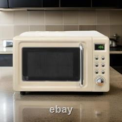 Ensemble de cuisine rétro élégant en crème : micro-ondes vintage, bouilloire rapide et grille-pain grand format.