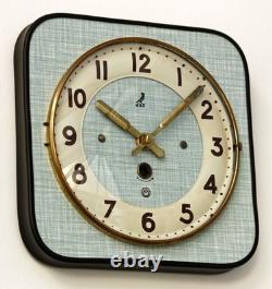 Horloge murale JAZ vintage 21 cm en formica français rétro mi-siècle atomique en bois