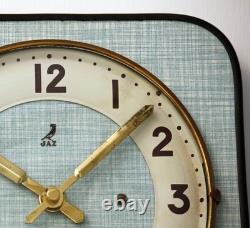 Horloge murale JAZ vintage 21 cm en formica français rétro mi-siècle atomique en bois